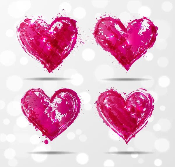 Four grunge pink hearts — Stock Vector