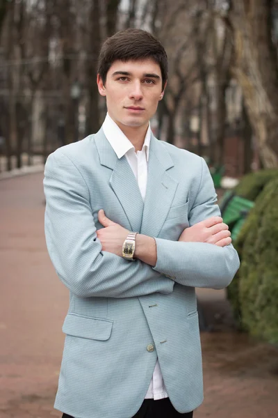 The young serious man in the city — Stock Photo, Image