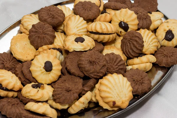 Festive cookies with chocolate cream — Stock Photo, Image