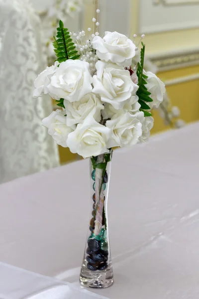 Artificial white roses in a vase — Stock Photo, Image