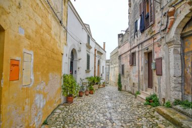 Matera 'nın manzarası, kayanın içine inşa edilmiş antik bir şehir. İtalya 'nın Basilicata bölgesinde yer almaktadır..