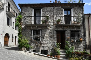 The facade of an old house in Sasso di Castalda, a village in the mountains of Basilicata, Italy.