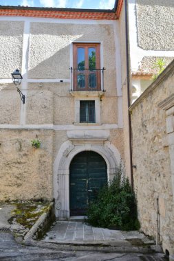 Facade of an old house in Teggiano, an Campania town in the province of Salerno, Italy.