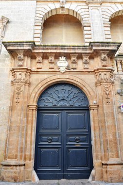 Entrance arch in a old house in Presicce, a village in the Puglia region in Italy.
