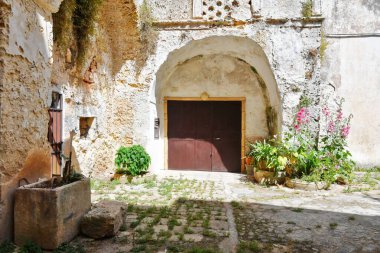 Entrance arch in a old house in Presicce, a village in the Puglia region in Italy.