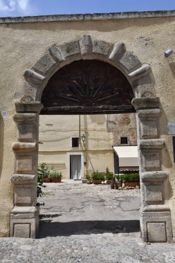 The entrance in an old house in Irsina, old town of Matera province, Italy.