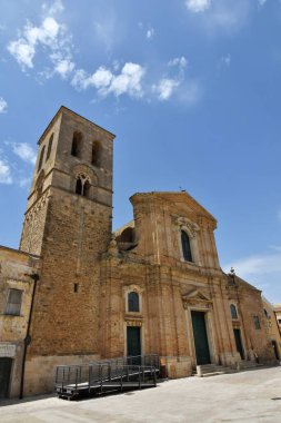 The facade of a cathedral of Irsina in Basilicata, region of southern Italy.