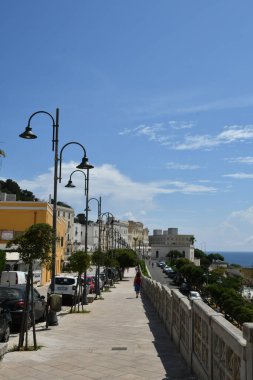 The avenue of a street in Santa Cesarea Terme, an Apulian village in the province of Lecce in Italy.
