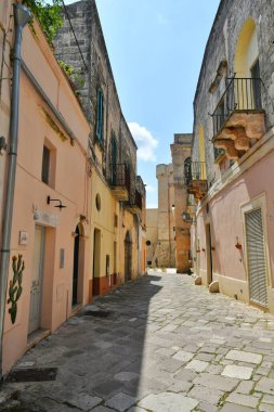 A street in the historic center of Tricase, a medieval town in the Puglia region, Italy.