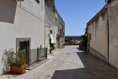 A street in the historic center of Specchia, a medieval town in the Puglia region, Italy.