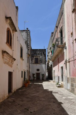A street in the historic center of Specchia, a medieval town in the Puglia region, Italy.