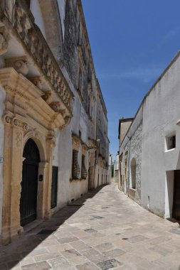A street in the historic center of Specchia, a medieval town in the Puglia region, Italy.