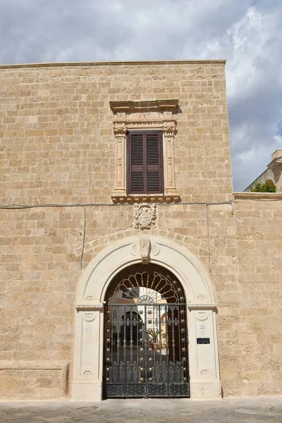 The facade of a characteristic house in Uggiano, a medieval town in the Puglia region of Italy.