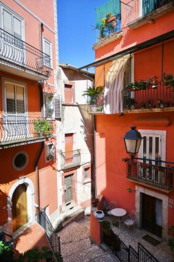 A narrow street between the old houses of Guardia Sanframondi, a village in the province of Benevento, Italy.
