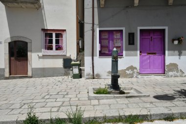 A fountain in a small square of Pietragalla, a village in the Basilicata region, Italy.