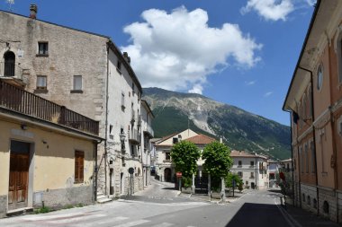 A street among the old stone houses of Campo di Giove, a medieval village in the Abruzzo region of Italy.