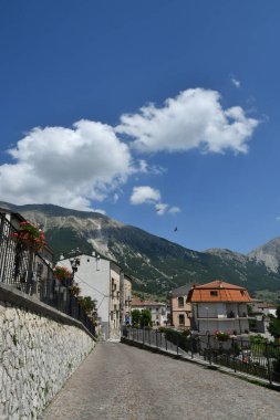 A street among the old stone houses of Campo di Giove, a medieval village in the Abruzzo region of Italy.