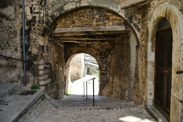 A street among the old stone houses of Campo di Giove, a medieval village in the Abruzzo region of Italy.