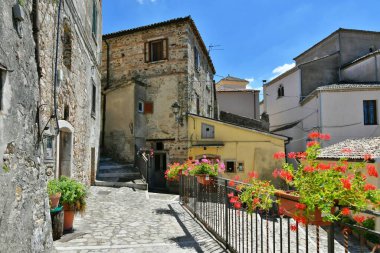 A small street between the old houses of Zungoli, one of the most beautiful villages in Italy.
