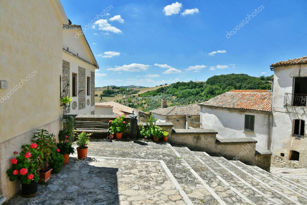 A small street between the old houses of Zungoli, one of the most