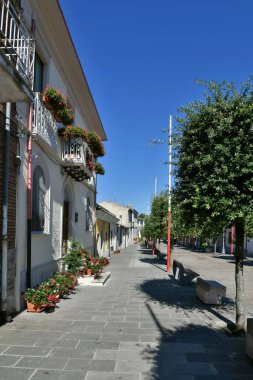 A small street between the old houses of Savignano Irpino, one of the most beautiful villages in Italy.