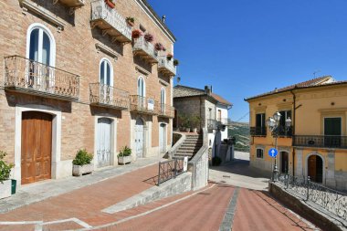 A small street between the old houses of Savignano Irpino, one of the most beautiful villages in Italy.