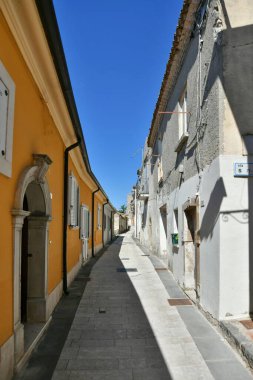 A small street between the old houses of Savignano Irpino, one of the most beautiful villages in Italy.