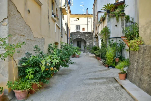 A narrow street in Castelvenere, a medieval village in the province of Avellino in Campania, Italy.