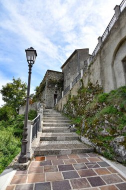 A narrow street in Castelgrande, a rural village in the province of Potenza in Basilicata, Italy.