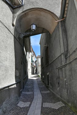 A narrow street in Castelgrande, a rural village in the province of Potenza in Basilicata, Italy.