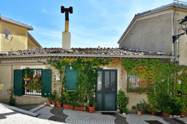 The facade of an old house in Castelgrande, a rural village in the province of Potenza in Basilicata, Italy.