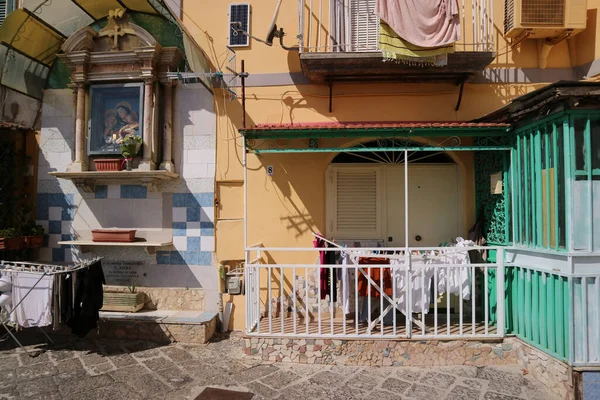 The characteristic house door of the historic district of the old city of Naples in Italy.