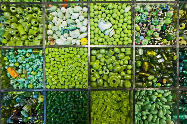 Assorted green beads — Stock Photo, Image