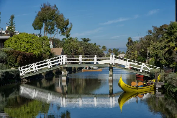 Boat and bridge reflection — Stock Photo, Image