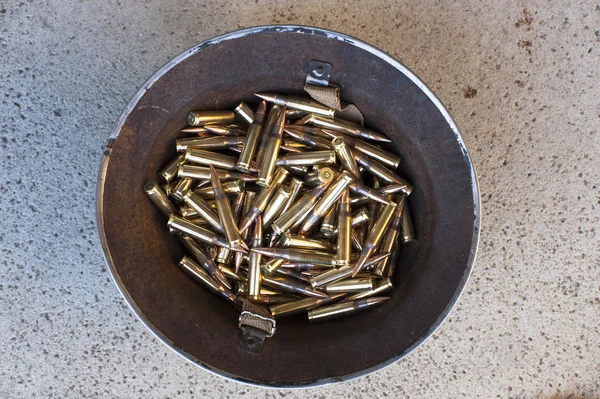 Rusty helmet bullets — Stock Photo, Image