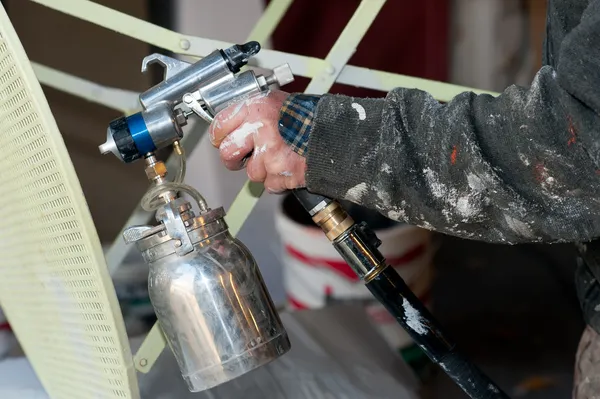 Spray painting table — Stock Photo, Image