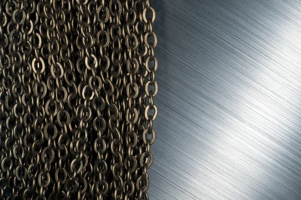 Łańcuchy i szczotkowanego metalu — Zdjęcie stockowe