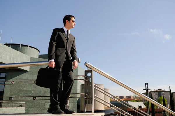 Businessman holding a briefcase — Stock Photo, Image