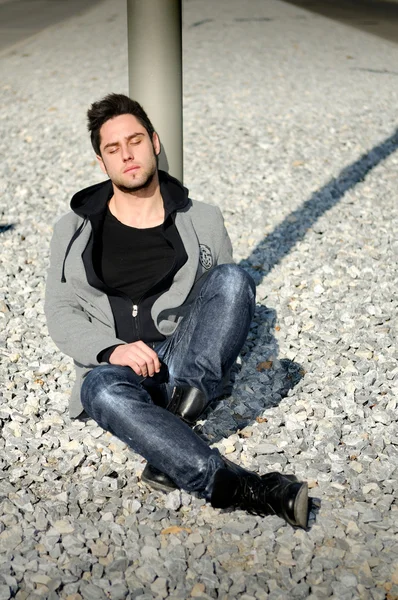 Portrait of handsome man in urban background — Stock Photo, Image