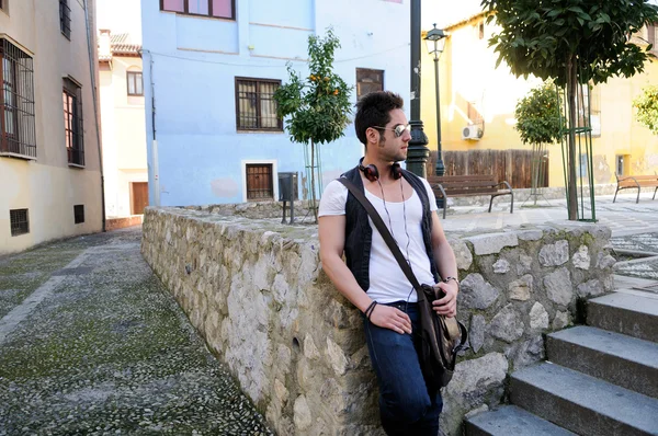 Portrait of young attractive man in urban background — Stock Photo, Image