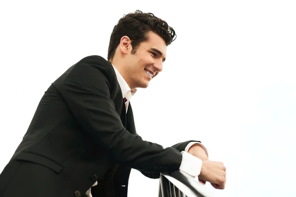 Young businessman in urban background — Stock Photo, Image