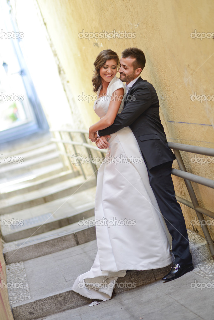Just married couple in urban background
