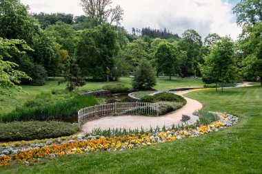 Spa Park in Marianske Lazne, a Spa Resort in Western Bohemia, Czech Republic with Usovicky Potok Stream, also called Auschabach or Schneiderbach.