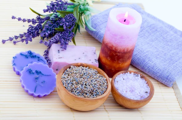 Dry Lavender herbs, bath salt and candle — Stock Photo, Image