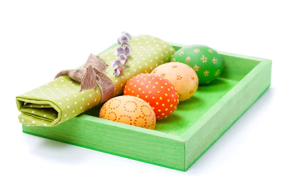 Easter egg with a serviette, in a tray for breakfast. isolated o — Stock Photo, Image