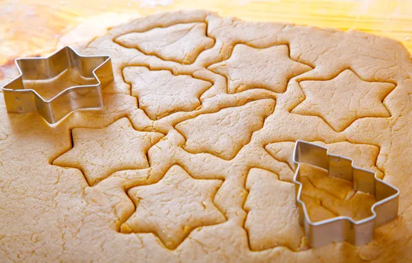 Cutting cookies dough star shape homemade for christmas — Stock Photo, Image