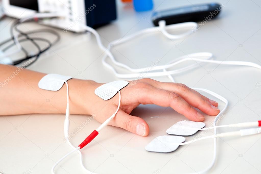 electrodes electric massage in physiotherapy room. tens therapy,