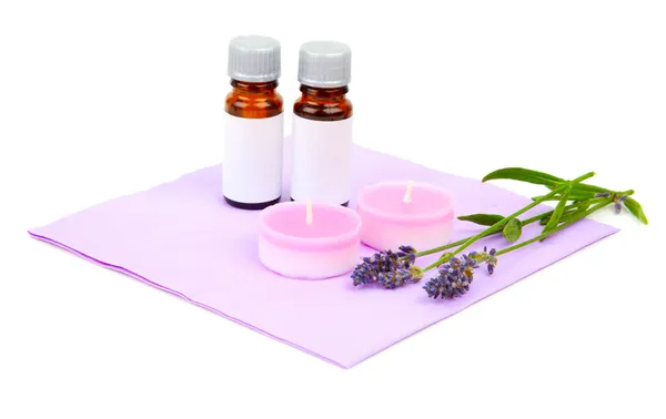 Lavender oil, candle and lavender flower, isolated on white back — Stock Photo, Image