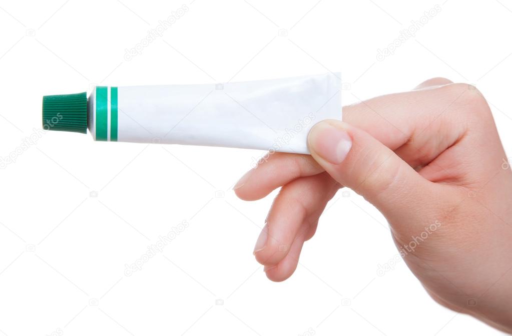 white tube with medical ointment, isolated on a white background