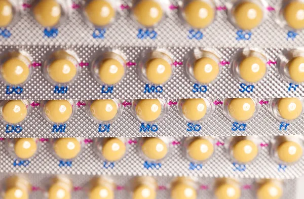 Anticonceptiepil. tabletten (Birth Control Pills) achtergrond — Stockfoto